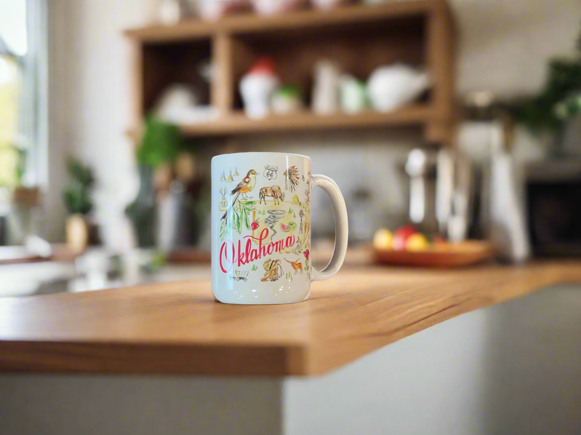 A ceramic coffee cup with a multicolor design, featuring text and decorative elements.